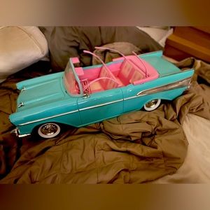 Barbie car. Vintage luxurious vintage car.